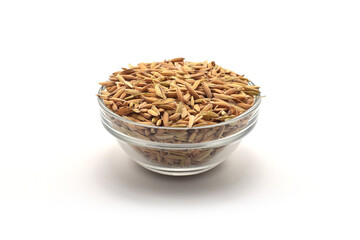 TOP VIEW OF RICE GRAIN ON BOWL ISOLATED ON WHITE BACKGROUND.