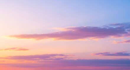 Obraz premium Pastel Sunset Sky with Soft Clouds.