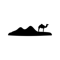 Silhouette of a majestic camel standing proudly on top of desert dunes