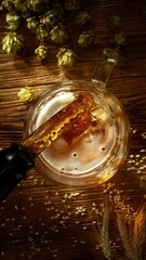 Pouring Beer into Pint Glass, Top Down View.