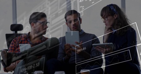 Colleagues collaborating on tablets in modern office lounge with coffee cup and data overlays