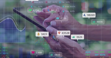 Displaying wrinkled hands tapping smartphone screen in garden, with social icons and charts