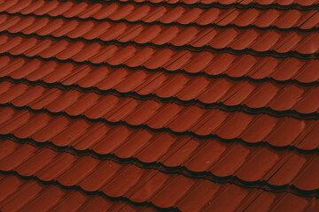 Close Up of Corrugated Brown Roof Tiles with Wave Pattern Texture