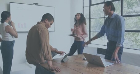 Four professionals meeting at table, code overlay appearing over bar chart and guiding analytics - Powered by Adobe