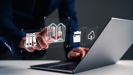 A person interacts with digital icons while using a laptop, showcasing concepts like organization, documents, and nature in a modern workspace.