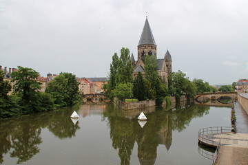 river moselle and reformed church (temple neuf) in metz in lorraine in france 