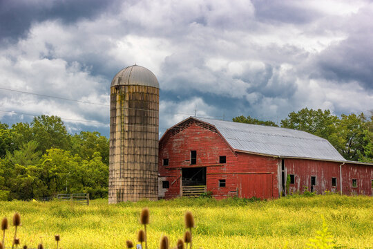 Agricultural landscape under cloudy skies in rural northeastern Tennessee, USA - Powered by Adobe