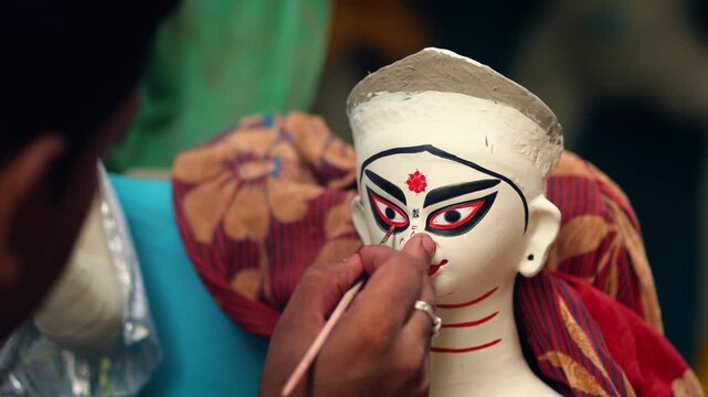 Maa Durga Chokkhu Daan, Making of goddess Durga Idol. These idols are made for Durga Puja at Kumartuli, the biggest festival of Kolkata, West Bengal
