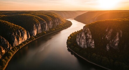 Serpentine River Flowing Through Steep Cliffs at Sunset.
