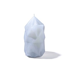 Obraz premium Geometric Candle: A close-up shot of a uniquely designed geometric candle, radiating a soft, ethereal glow and perfect for ambiance, creating a serene atmosphere.