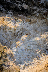 Gray mountain rock texture for background close-up