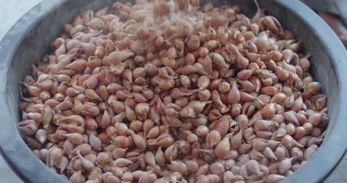 Add lime to the onions to improve the soil to a neutral pH level, which will help reduce the acidity of the soil and help plants absorb nutrients better.