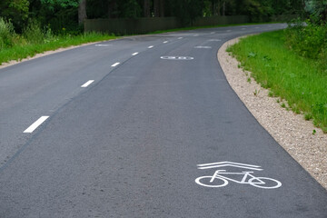 Obraz premium White Cycling sign painted on the road