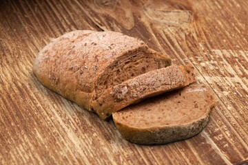 Freshly baked tasty sourdough bread on desk