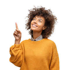 Confident Sub-Saharan woman points upward in orange sweater