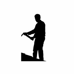 Silhouette of roofing installer with hand saw trimming sheet isolated on white background