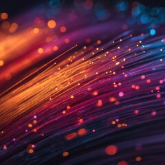 Abstract close-up of glowing fiber optics with bokeh lights in vibrant orange, pink, and blue hues
