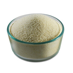 raw semolina flour known in India as rava flour, soji, or sooji in glass bowl, use in famous Indian Gujarati traditional foods and sweet ingredient  cutout in transparent background, png format