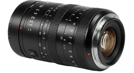 Detailed close up of a black professional camera lens with aperture and focus rings isolated on white background
