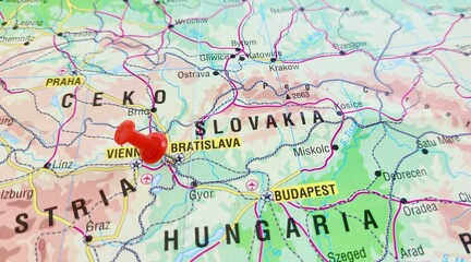 View of Bratislava, is the capital and largest city of the Slovak Republic and the fourth largest of all cities on the river Danube, on a geographical map of Europe, marked with red push pin