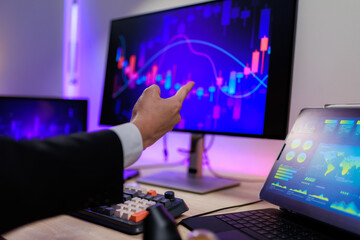 Trader cheering with joy as the stock market surges upward.