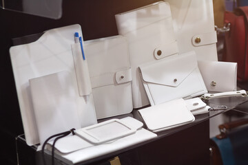 White leather goods in a shop window