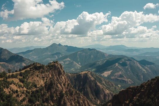 Wide-angle Scene of Mountainous Terrain and Expansive Sky