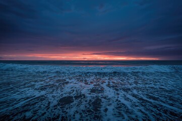 Wide View of Stormy Ocean and Night Sky