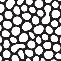 Abstract organic pattern of white irregular shapes on a black background creating a textured cellular or bubbly visual effect