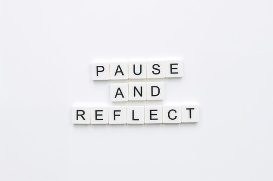 Contemplate and take a break with stunning books. Elegant white paper backdrop. Inspirational business lifestyle pause theme. Space for text.