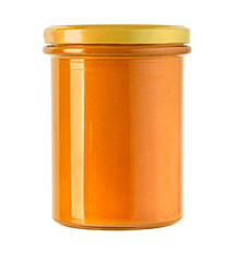 Glass jar with orange jam and golden lid