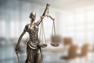 Femida statue in a lawyer's office for legal consulting.