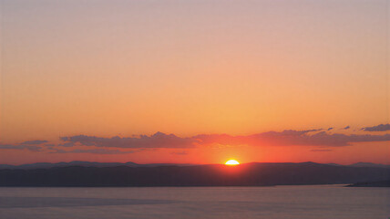 Obraz premium Vibrant Sunset over Mountain Lake