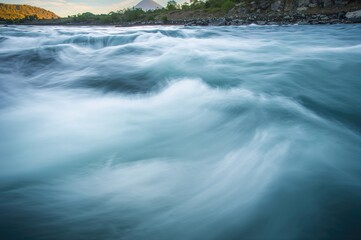 Extended exposure shot of a rapidly moving stream with water texture background
