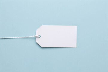 Blank label on a pale blue surface, viewed from above