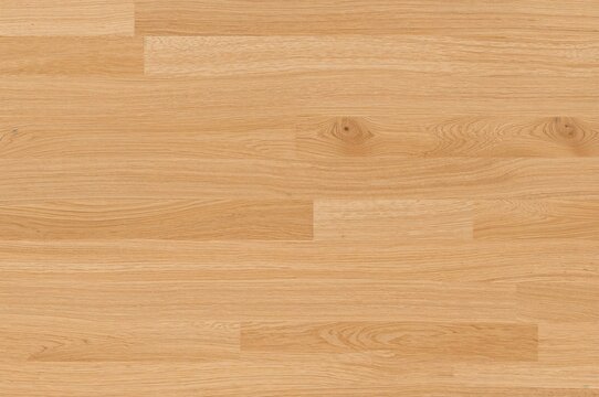 Top view of a sleek formica surface with a wood grain pattern and marble backdrop