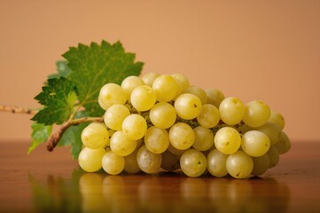 Cluster of fresh white grape berries on a surface
