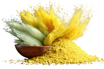 Colorful powder explosion with yellow and green pigment erupting from a wooden bowl on transparent background