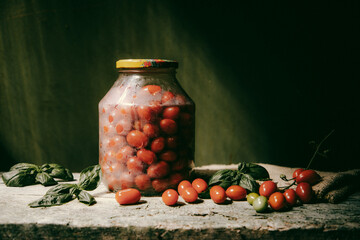 red and yellow cherry tomatoes in a jar for winter