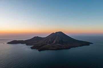 Sunset over an erupting mountain on a Mediterranean island