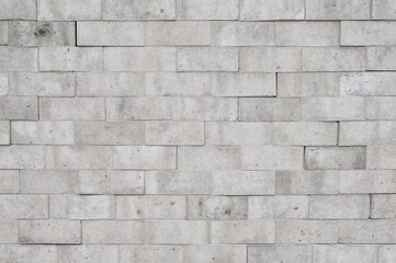 Retro white and grey brick backdrop with abstract geometric design, traditional stone wall texture for exterior structures.