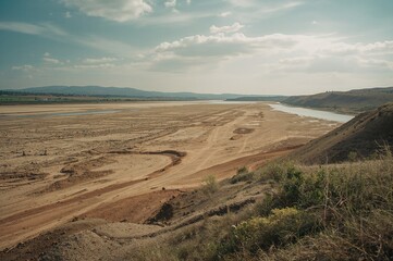 Scenic view of nature harmed by dam failure and town inundation