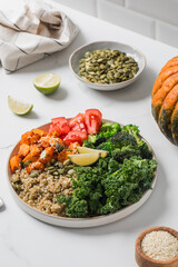 Healthy vegan buddha bowl with quinoa, pumpkin and vegetables. Vegetable recipes