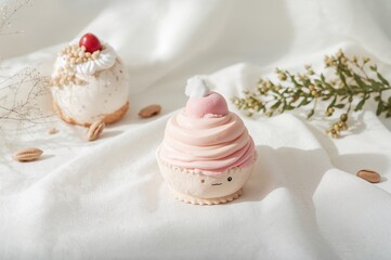 Soft dessert-themed plush toy on a cozy backdrop