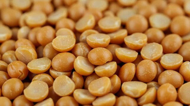 Closeup of vibrant yellow split peas, a nutritious and versatile legume