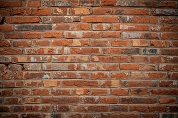 The backdrop of a partially constructed brick wall