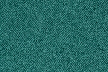 Fototapeta premium Curved upholstery fabric in green teal and tosca hues, crafted from cotton and wool featuring floral leaves and chevron designs. Knitting theme, ideal for apparel. Continuous fabric background