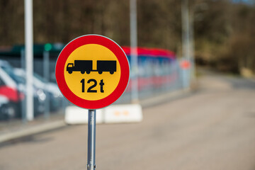 Weight restriction road sign for trucks twelve tons.