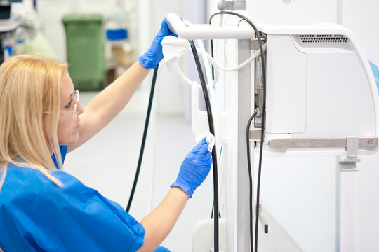 Nurse disinfecting endoscope for medical sterilization process