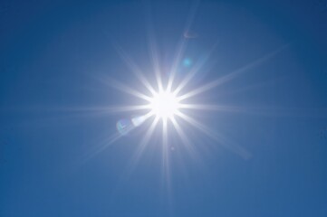 Radiant Sunlight Under a Crisp Azure Sky. Concept of Solar Energy Harnessing Natural Sun Rays. Earth's Atmosphere and Protective Ozone Layer.